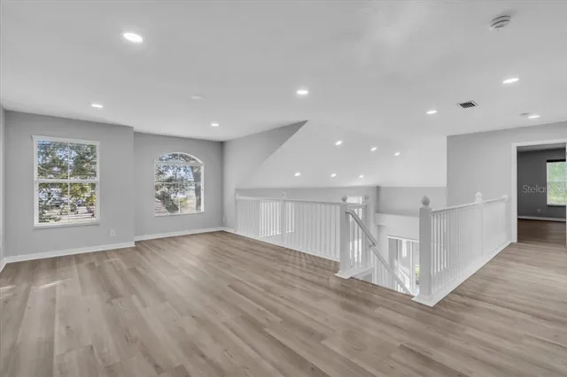 a view of entryway with wooden floor