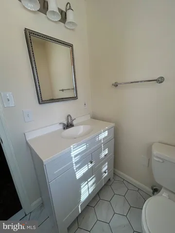 a bathroom with a shower and toilet