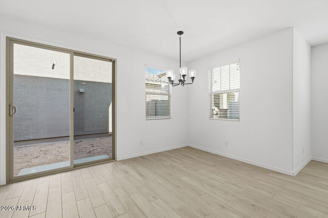 10048 West Piccadilly Road Avondale, AZ 85392 - Photo 13 of 49 a view of an empty room with a window