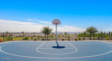10048 West Piccadilly Road Avondale, AZ 85392 - Photo 45 of 49 a view of a swimming pool with a yard