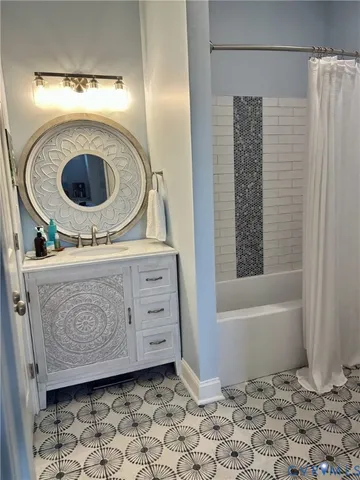 a bathroom with a sink a vanity and a mirror