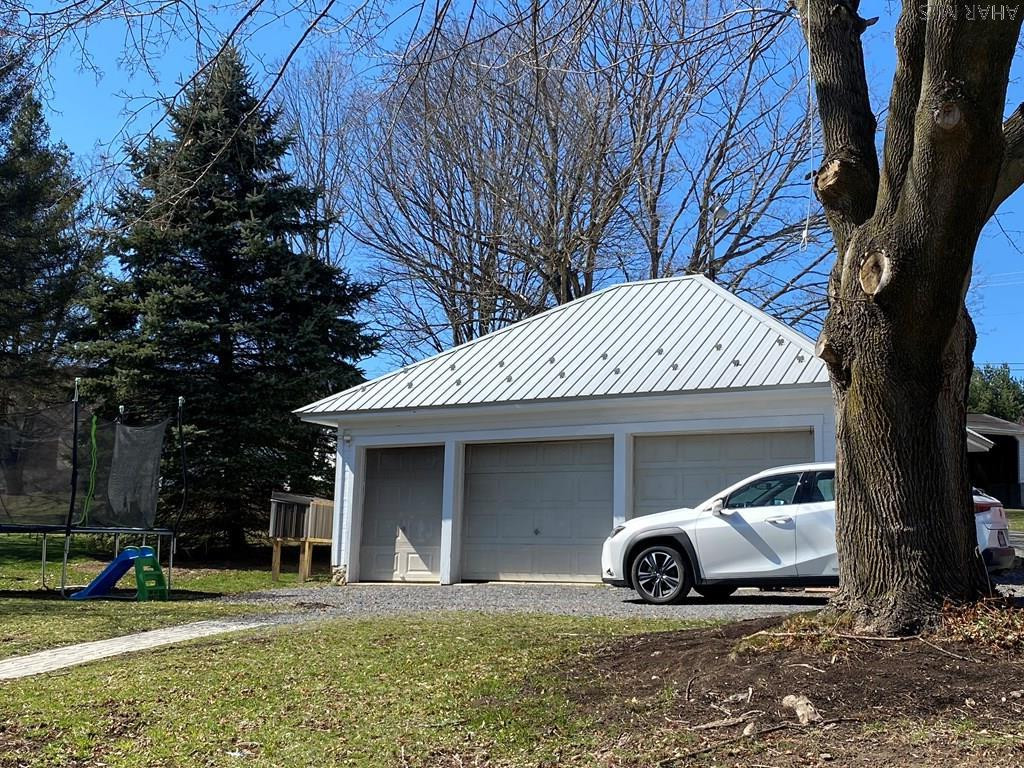 165 Springview Road Schellsburg, PA 15559 - Photo 60 of 63 a front view of a house with a yard