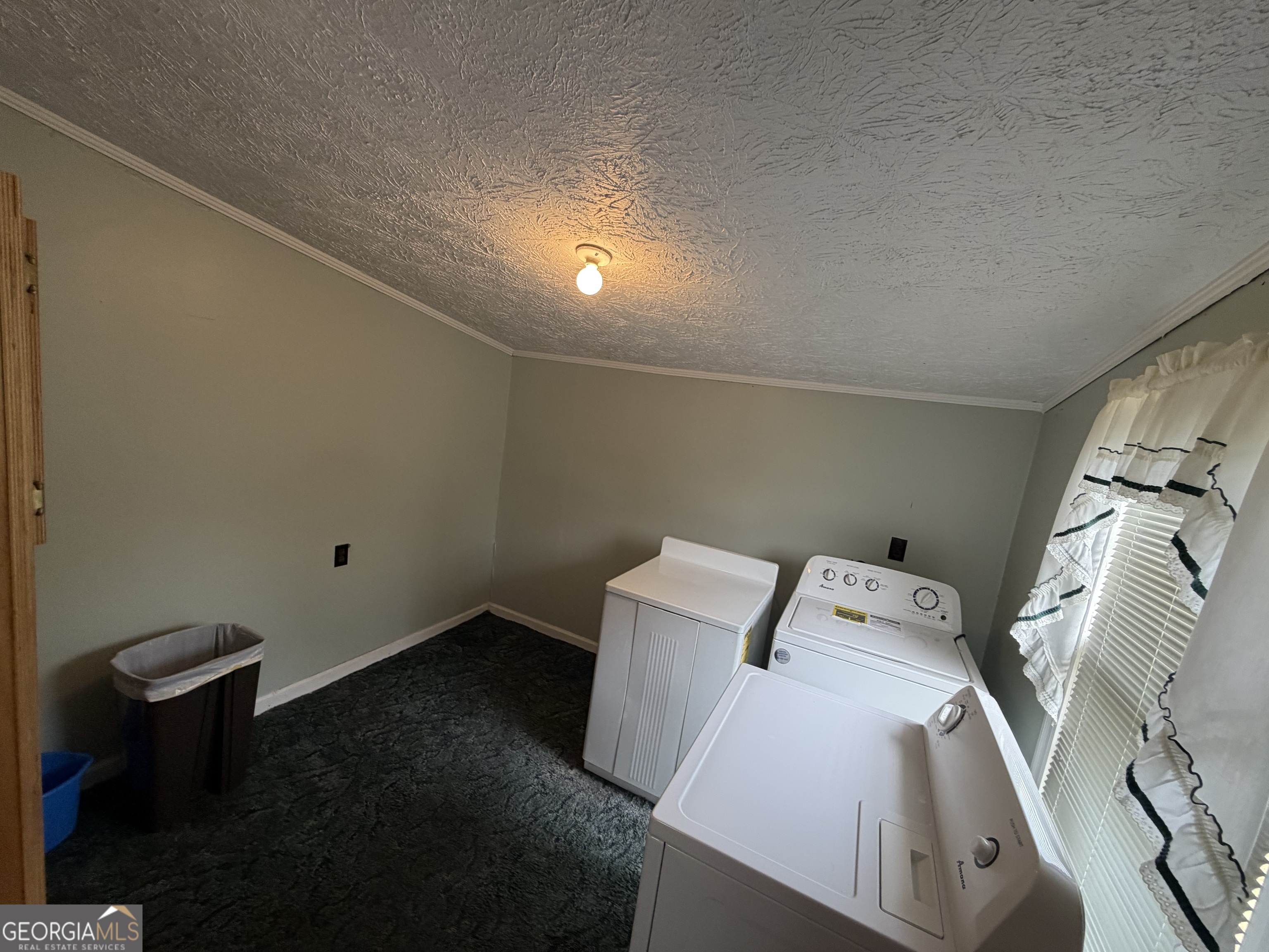 17 2nd Street McRae-Helena, GA 31037 - Photo 14 of 51 a utility room with dryer and washer