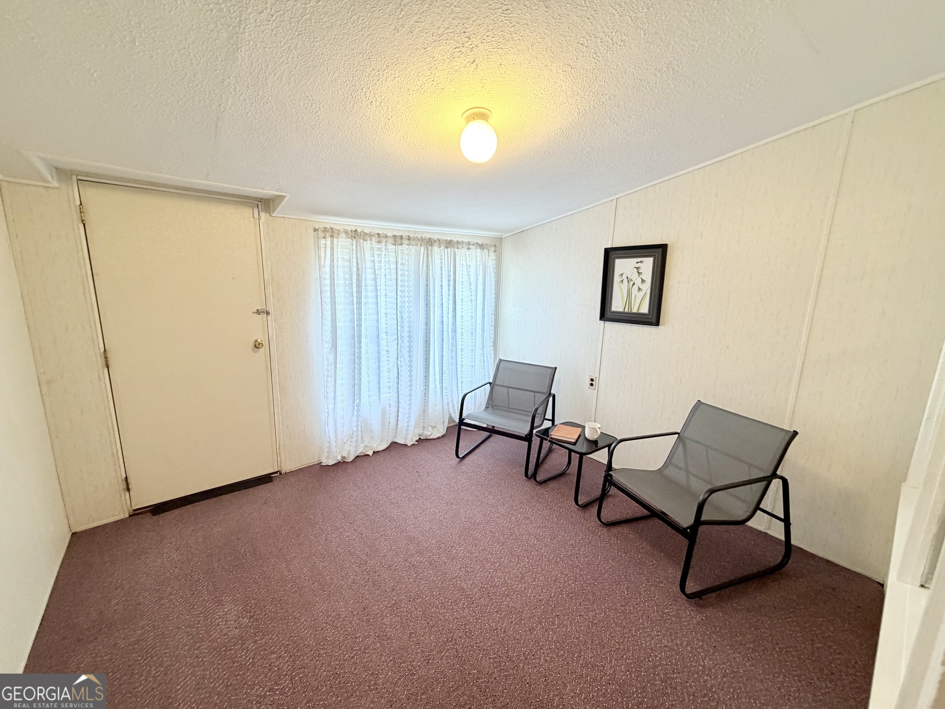 17 2nd Street McRae-Helena, GA 31037 - Photo 22 of 51 a view of livingroom with furniture and windows