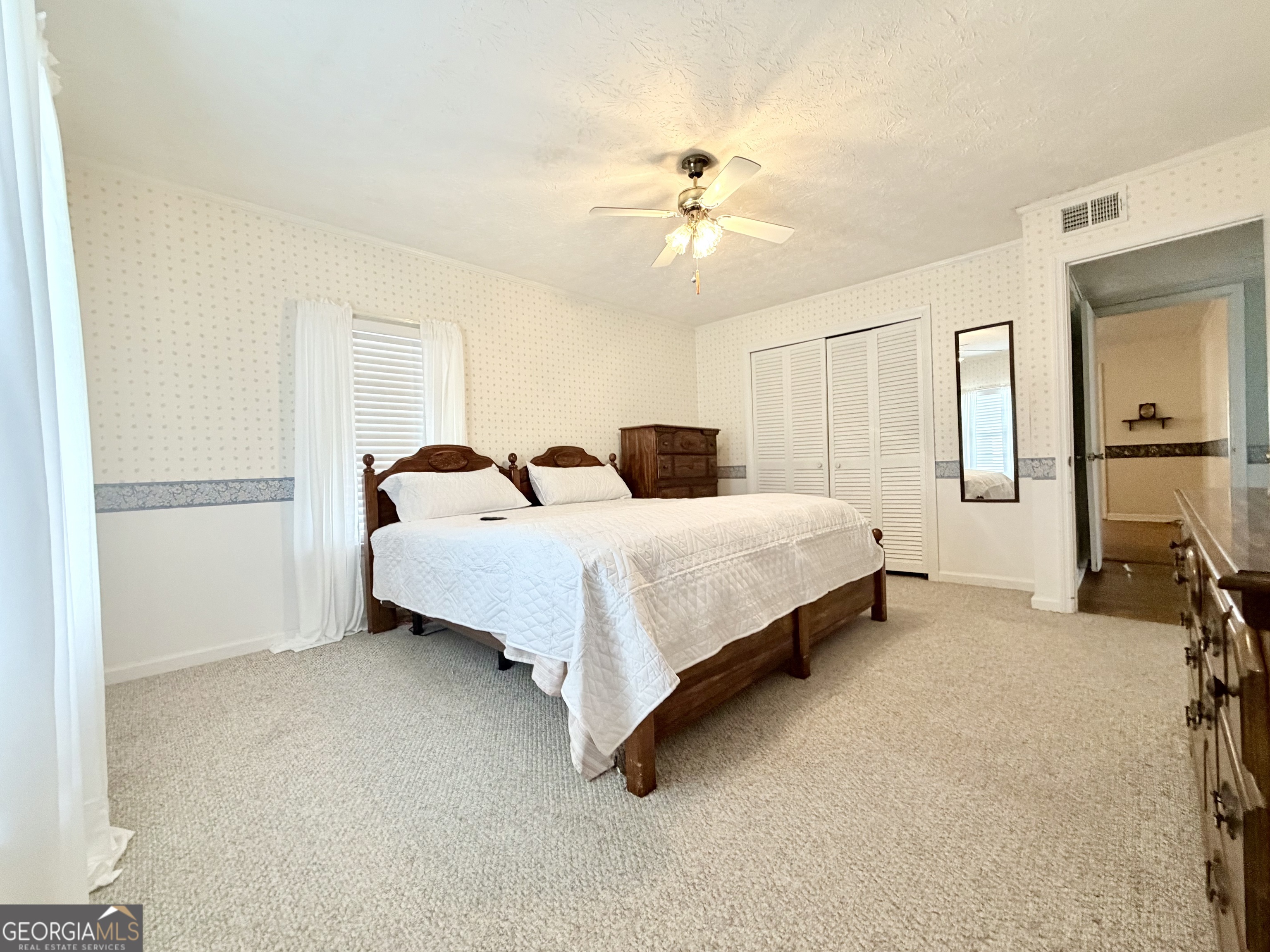 17 2nd Street McRae-Helena, GA 31037 - Photo 25 of 51 a bedroom with bed and window