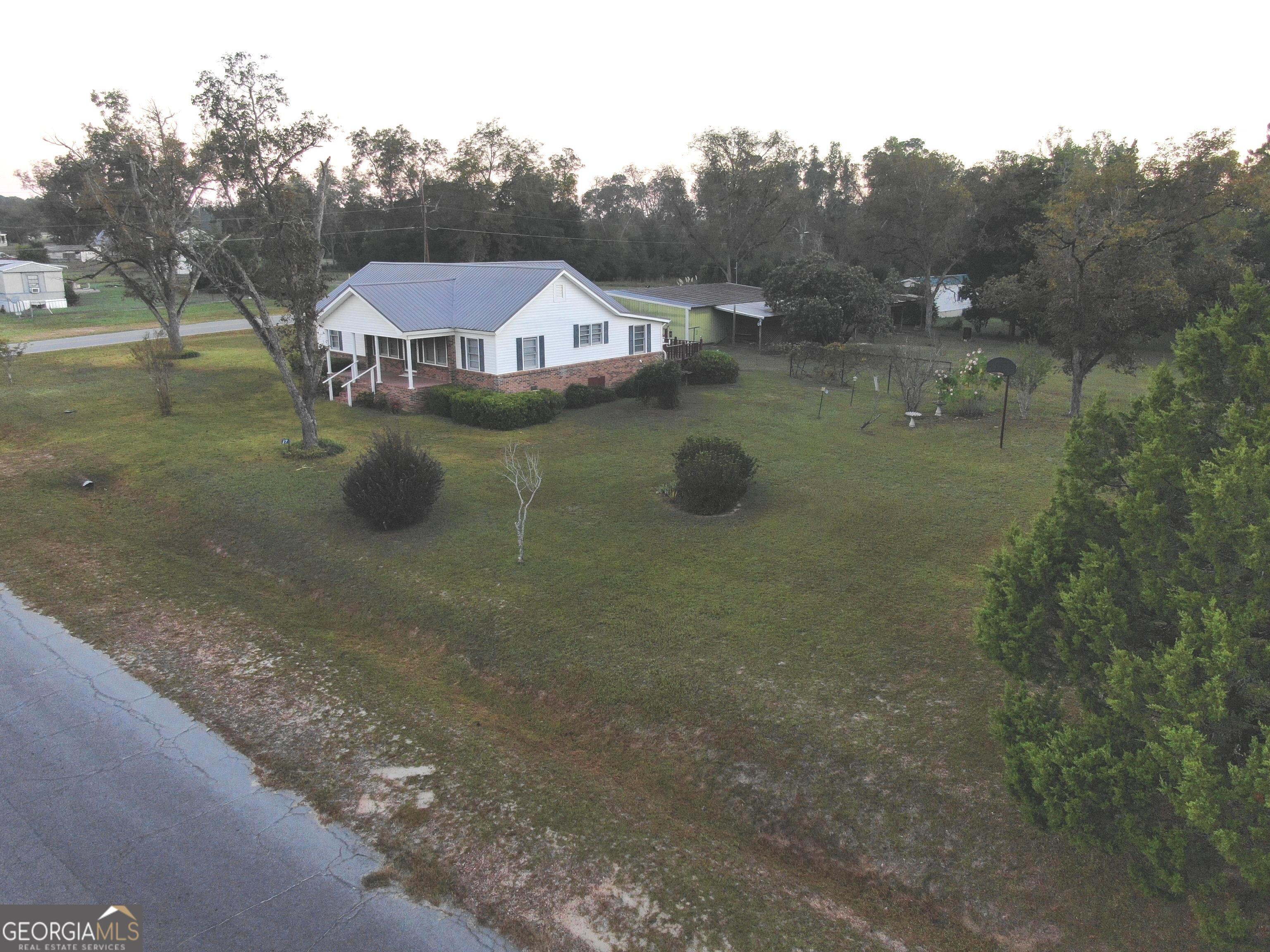 17 2nd Street McRae-Helena, GA 31037 - Photo 3 of 51 a view of a house with a yard