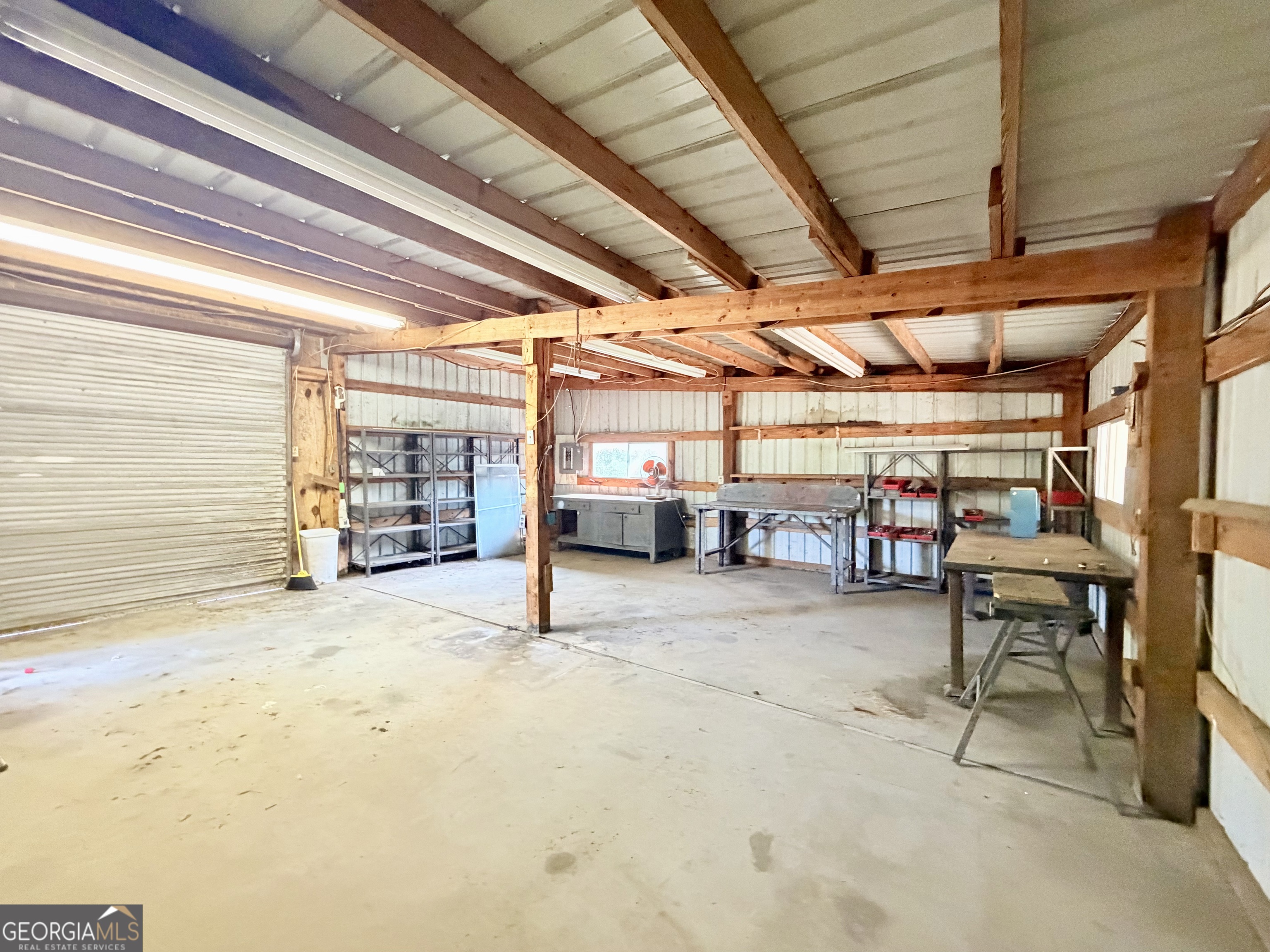 17 2nd Street McRae-Helena, GA 31037 - Photo 37 of 51 a view of a garage with wooden table