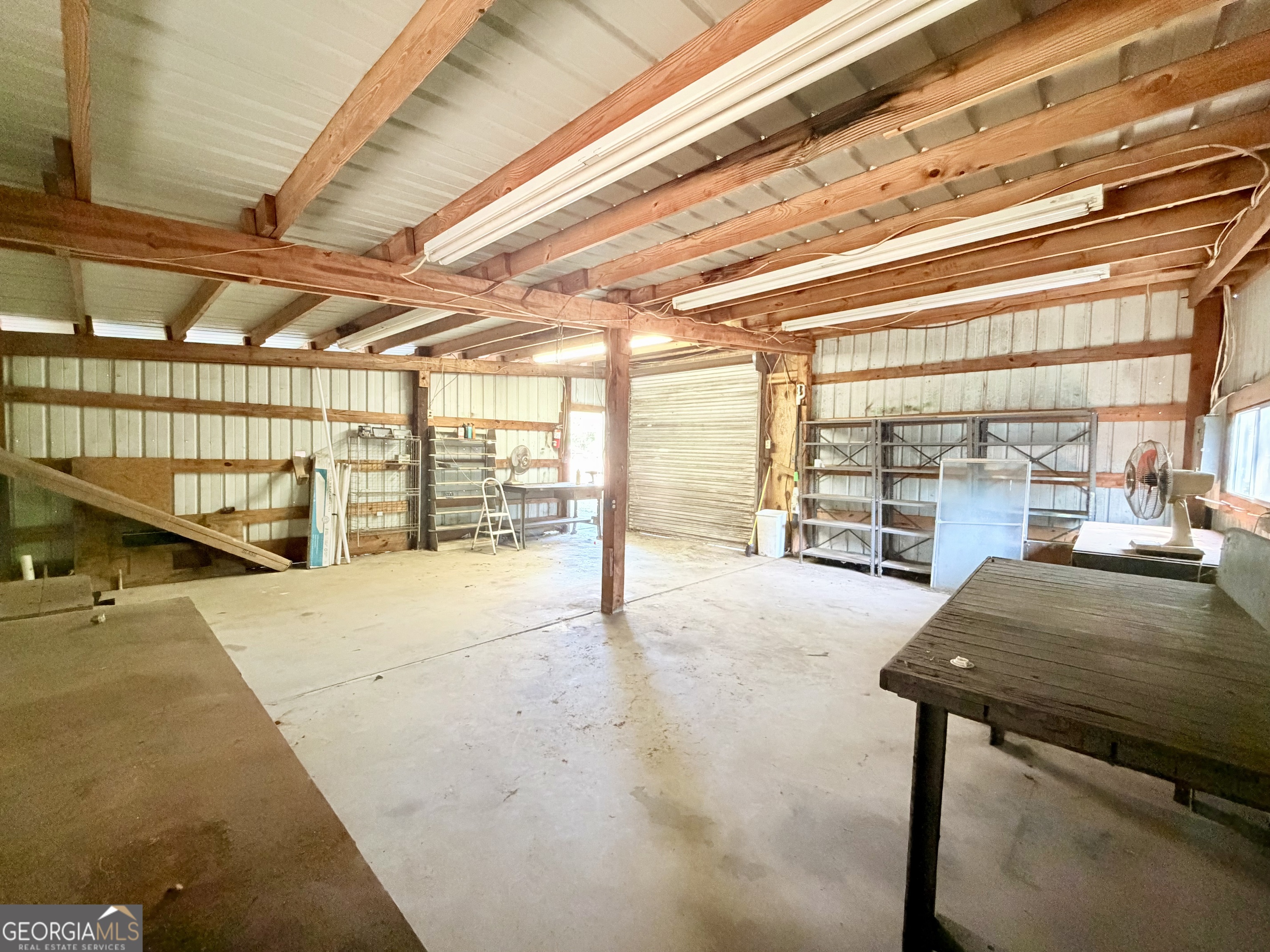 17 2nd Street McRae-Helena, GA 31037 - Photo 38 of 51 a view of a room with racks on the wall