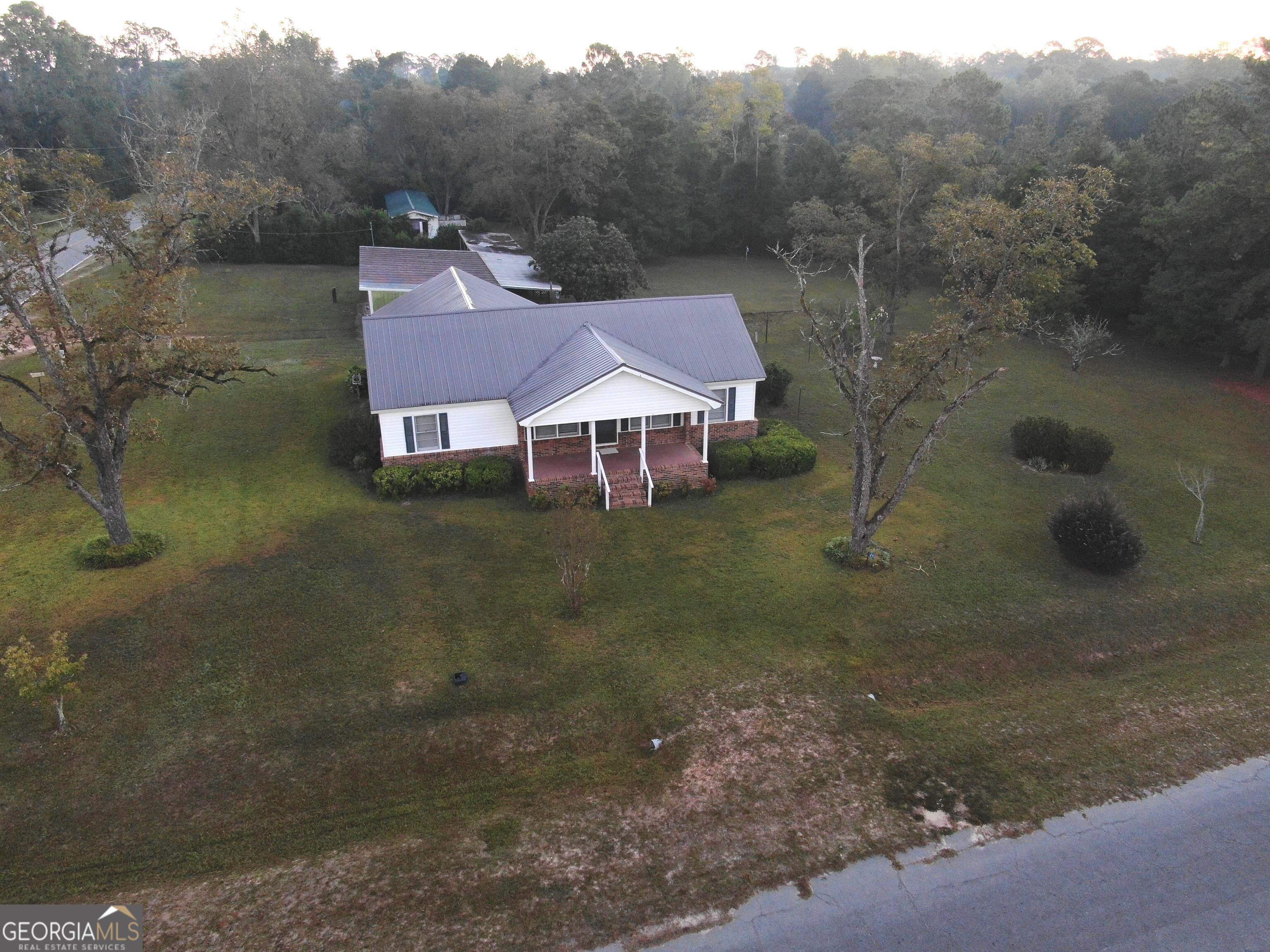 17 2nd Street McRae-Helena, GA 31037 - Photo 41 of 51 a aerial view of a house with a yard