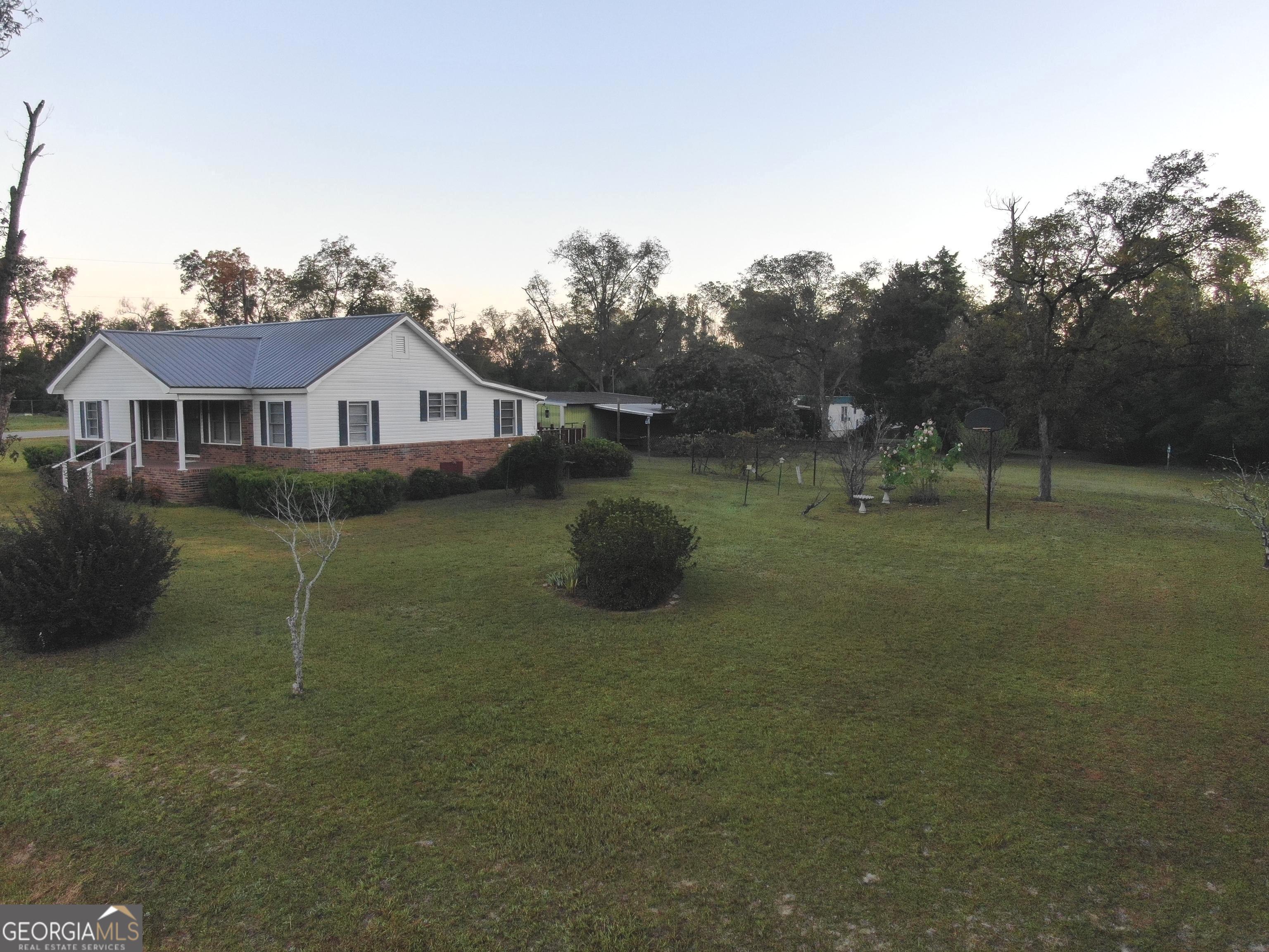 17 2nd Street McRae-Helena, GA 31037 - Photo 45 of 51 a view of a house with backyard