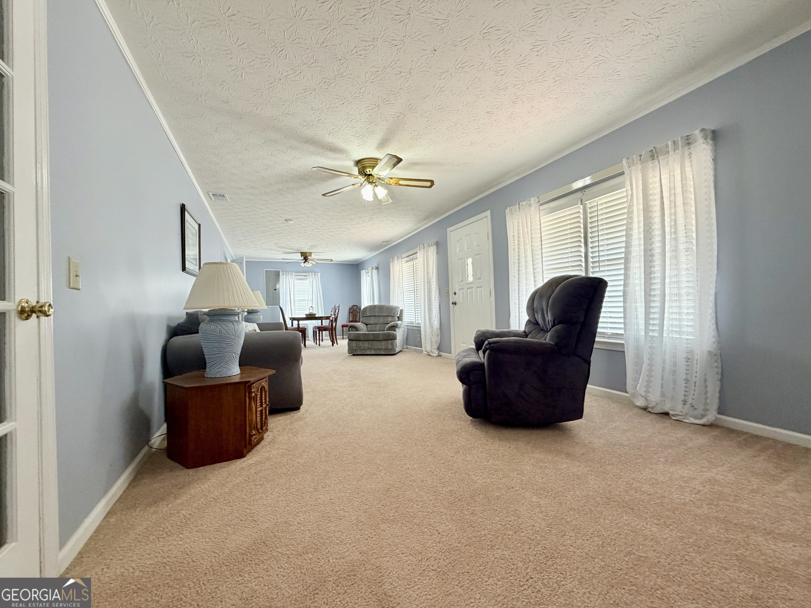 17 2nd Street McRae-Helena, GA 31037 - Photo 6 of 51 a living room with furniture and a window