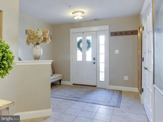 a view of a bathroom with a shower and a toilet
