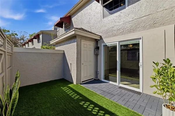 a view of a back yard of the house