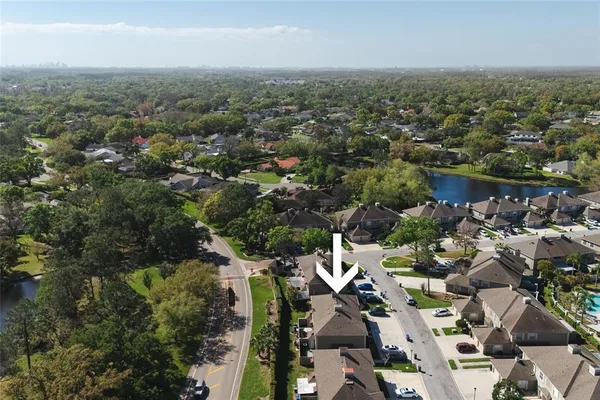an aerial view of a city with lots of residential buildings