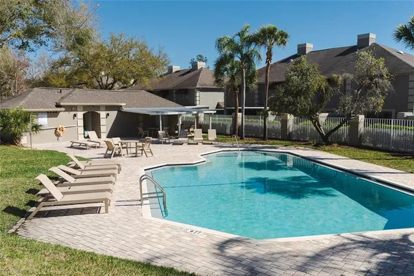 a view of a house with swimming pool