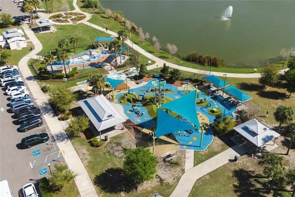 an aerial view of a house with a swimming pool