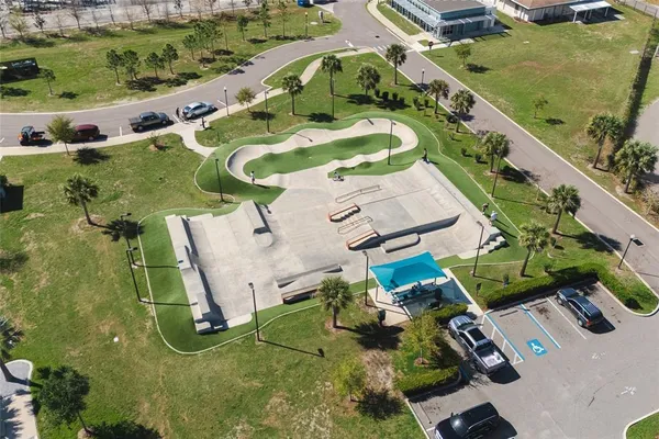 an aerial view of a house with a garden