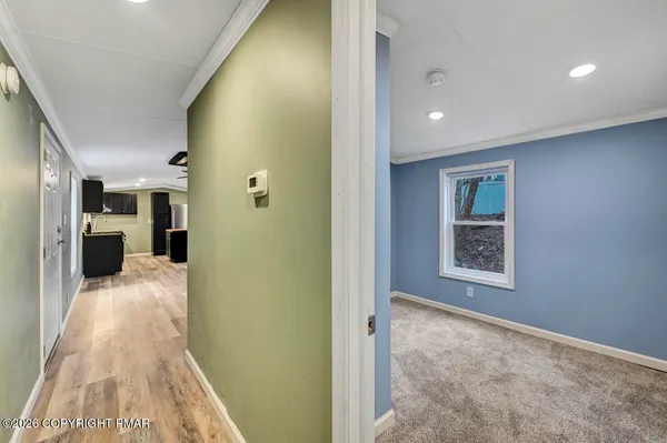a bathroom with a toilet sink and shower