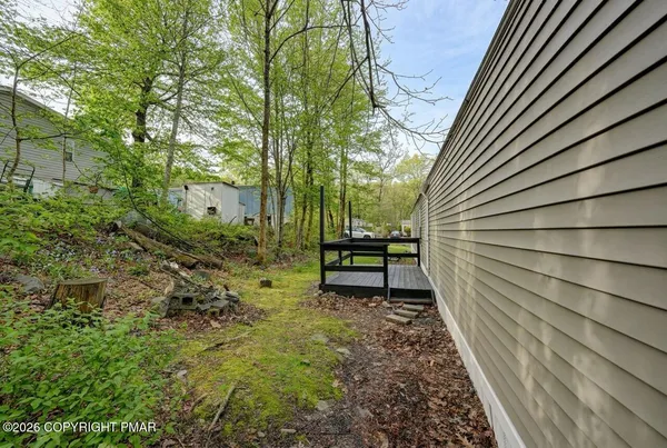 a view of a backyard with a garden