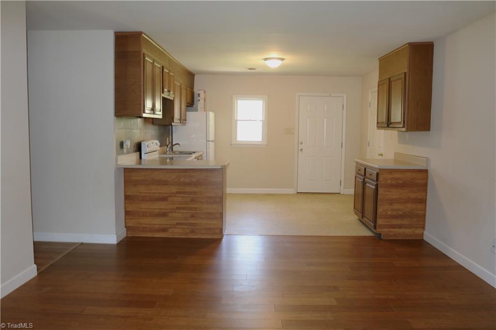 6327 Phillippi Road Julian, NC 27283 - Photo 5 of 16 Dining Area and Kitchen