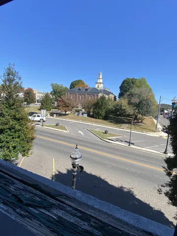 a view of empty room with windows