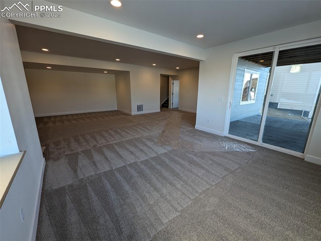 16966 Starfall Drive Monument, CO 80132 - Photo 7 of 18 a view of hallway with stairs