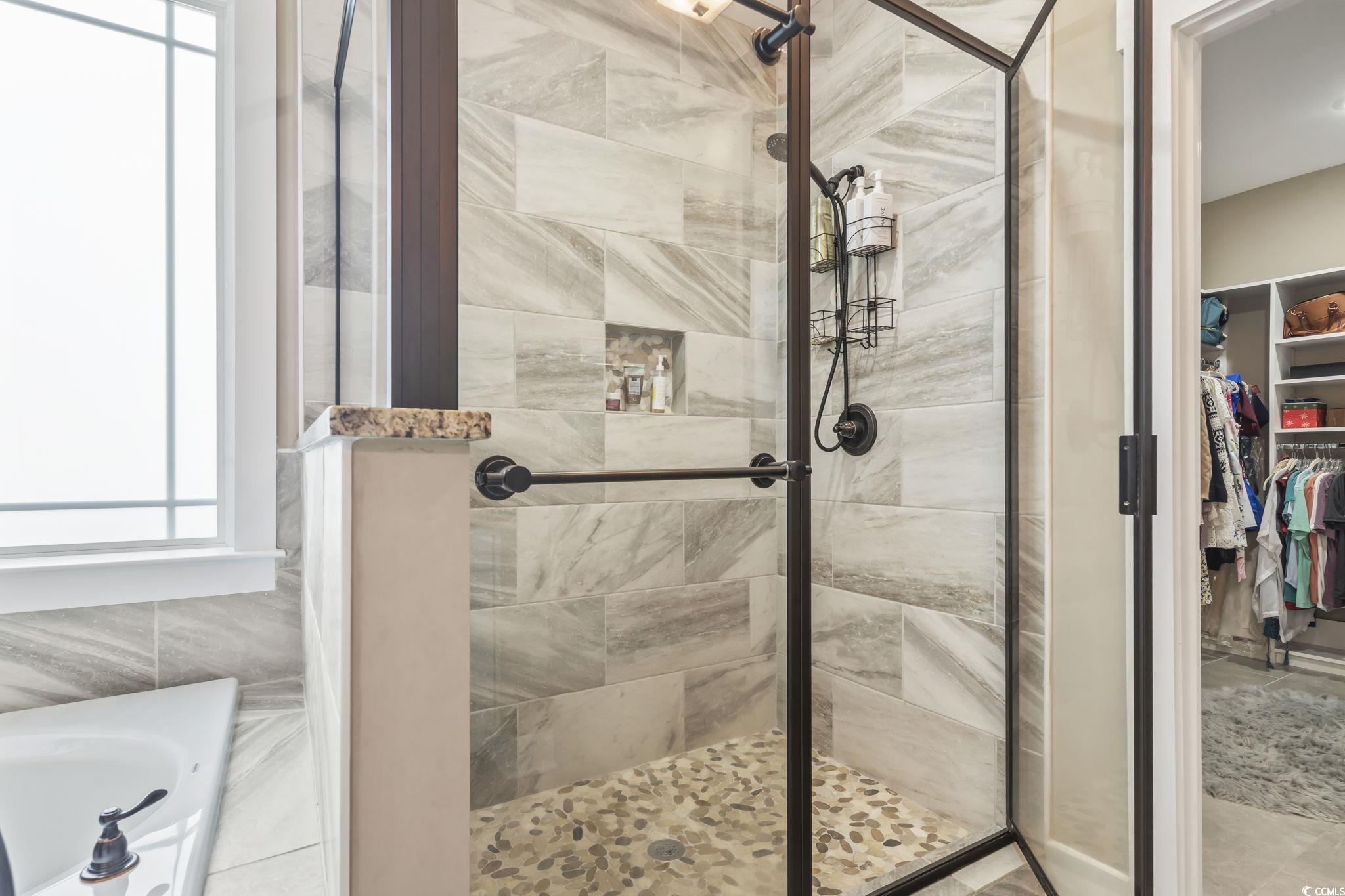 175 Rivers Edge Drive Conway, SC 29526 - Photo 19 of 37 Full bath featuring a spacious closet, a stall shower, and healthy amount of natural light