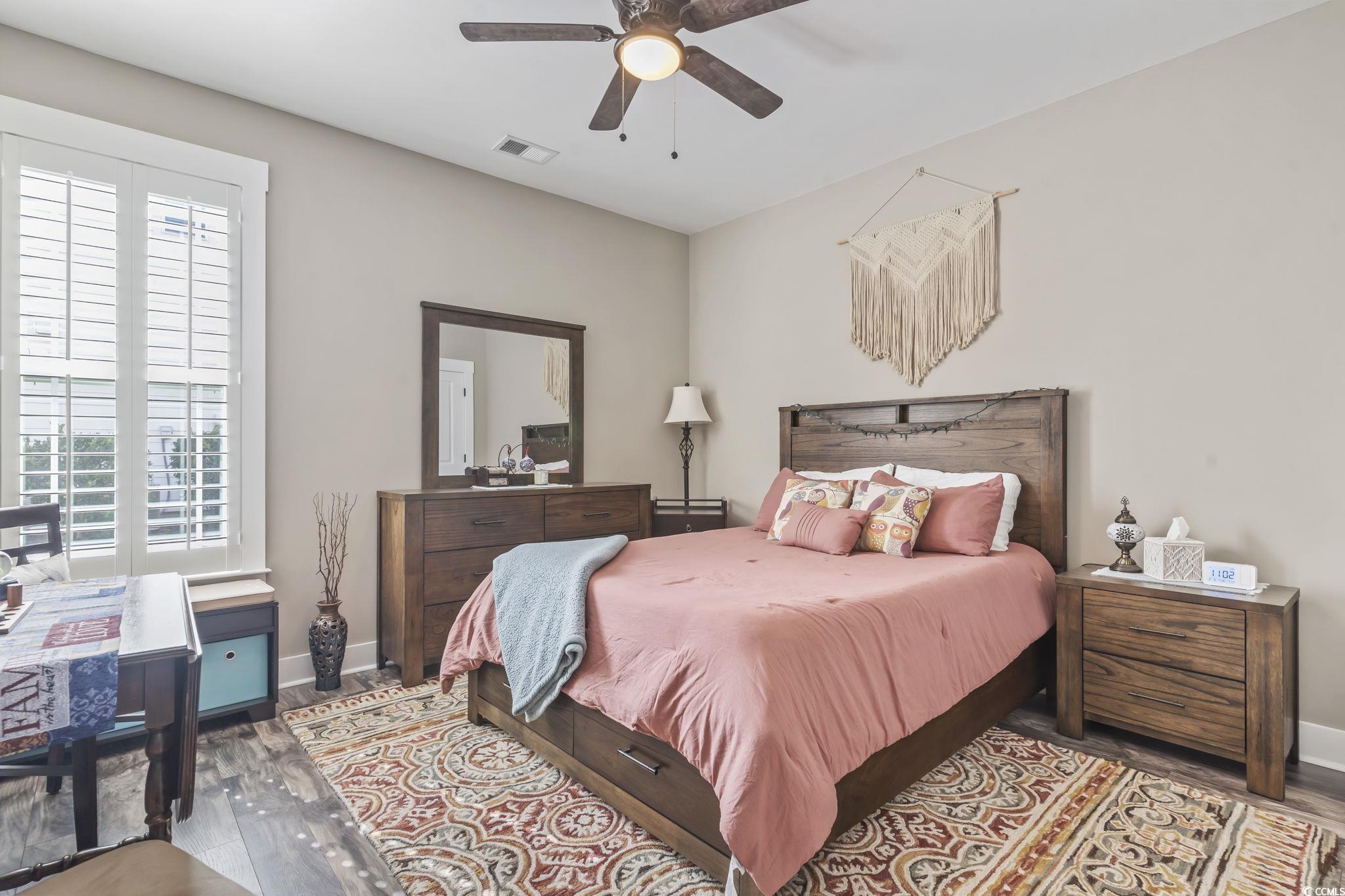 175 Rivers Edge Drive Conway, SC 29526 - Photo 23 of 37 Bedroom featuring dark wood-style flooring and a ceiling fan