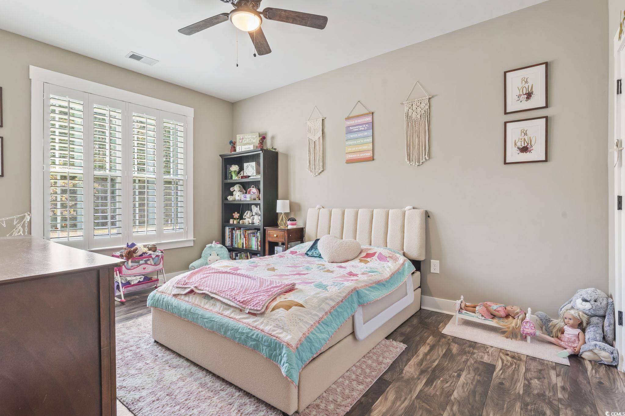 175 Rivers Edge Drive Conway, SC 29526 - Photo 24 of 37 Bedroom featuring dark wood-style floors and a ceiling fan