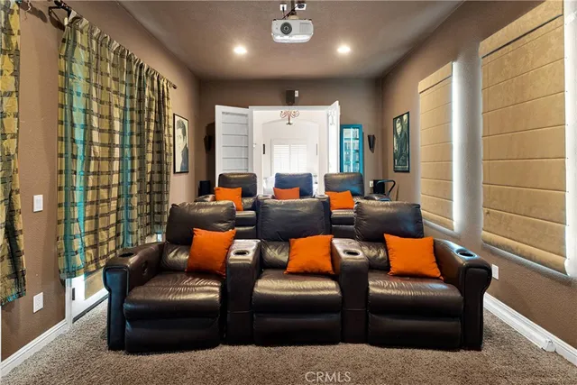 a view of a livingroom with furniture and a fireplace