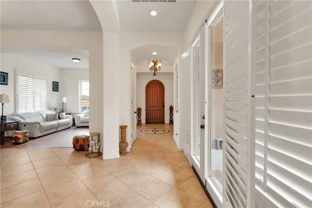 a large kitchen with a table and chairs