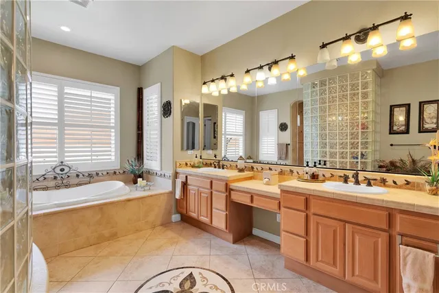 a bathroom with a toilet and shower