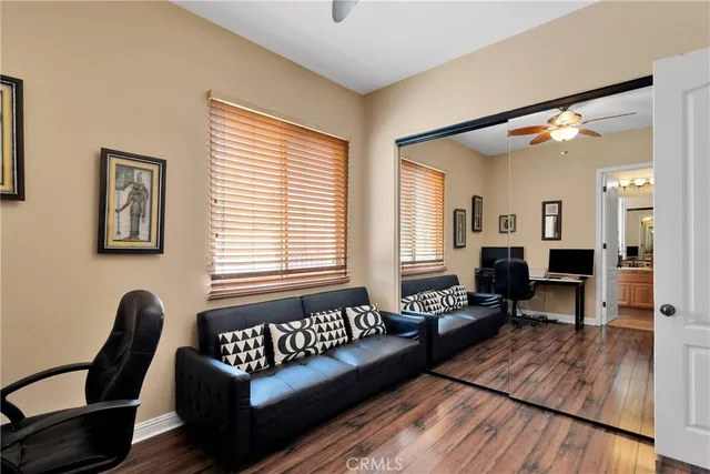 a swimming pool with yard and outdoor seating