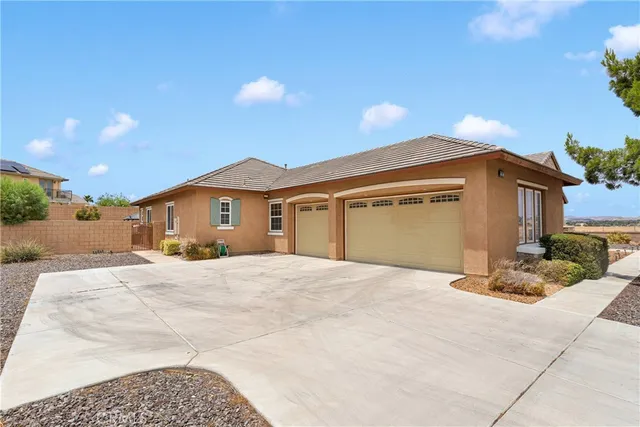 a bedroom with a bed and a mirror