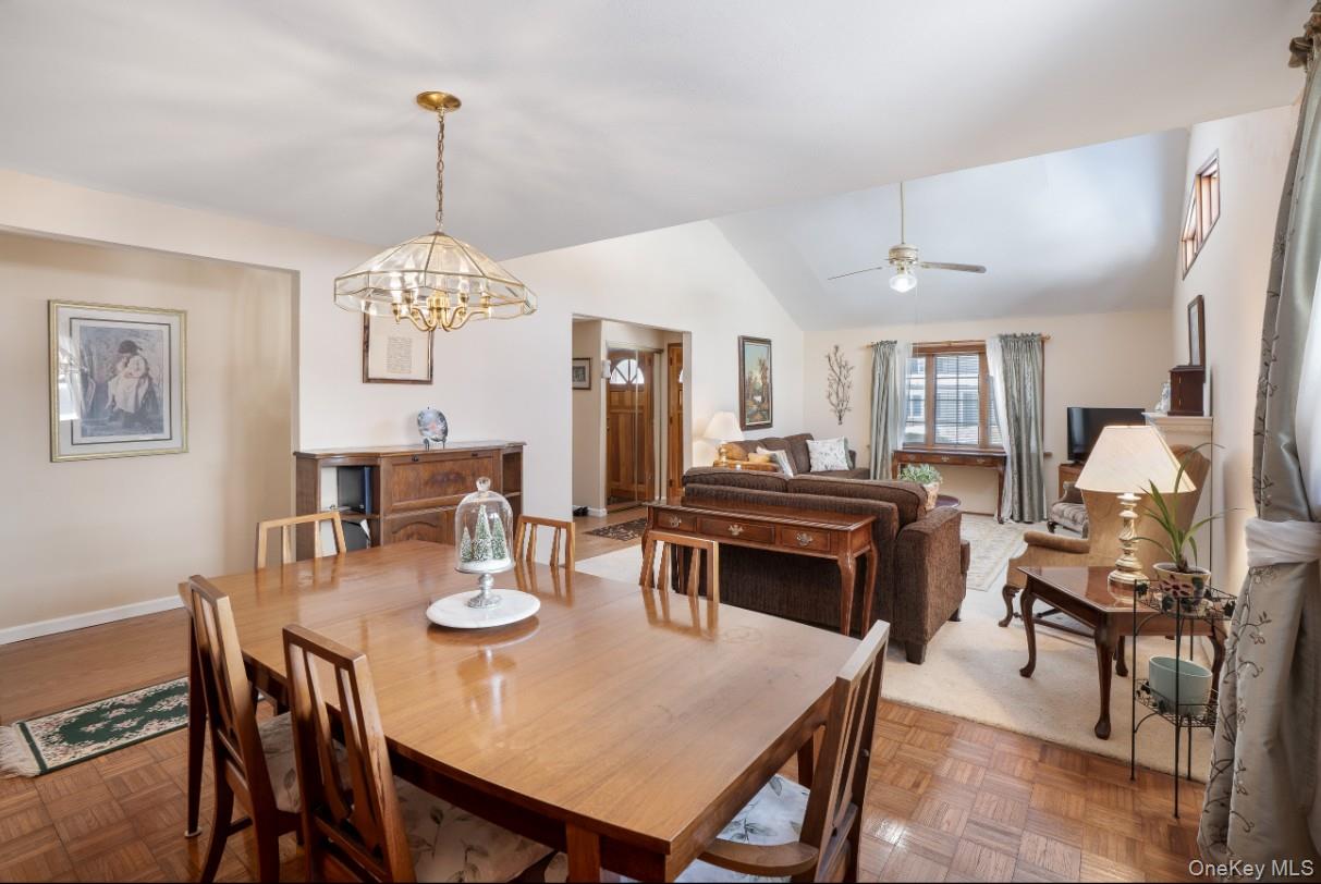 69 Riviera Drive Selden, NY 11784 - Photo 9 of 20 a view of a dining room with furniture