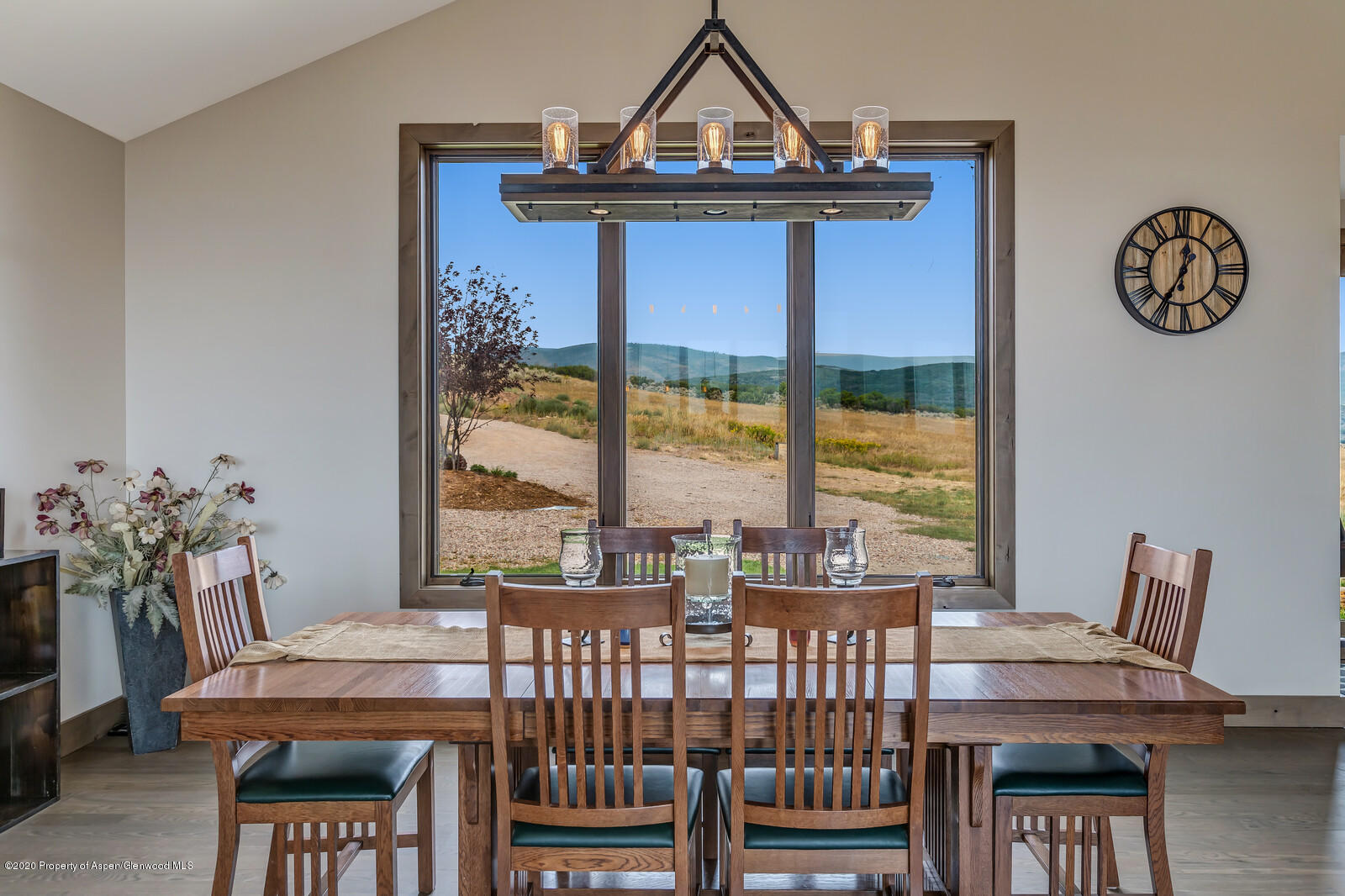 1009 Cattle Creek Ridge Road Carbondale, CO 81623 - Photo 11 of 40 a view of a dining room with furniture window and outside view