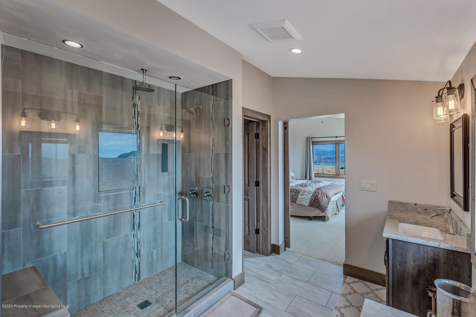 1009 Cattle Creek Ridge Road Carbondale, CO 81623 - Photo 18 of 40 a bathroom with a shower and a sink