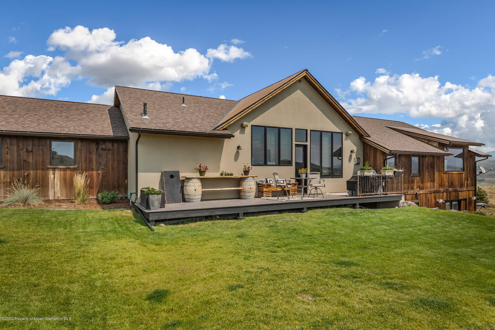1009 Cattle Creek Ridge Road Carbondale, CO 81623 - Photo 27 of 40 a front view of a house with swimming pool having outdoor seating
