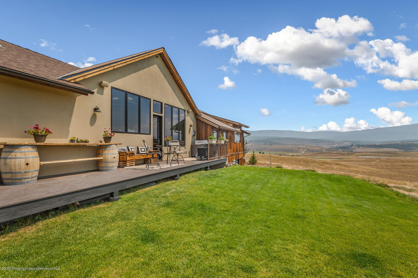 1009 Cattle Creek Ridge Road Carbondale, CO 81623 - Photo 28 of 40 a front view of house with yard and outdoor seating