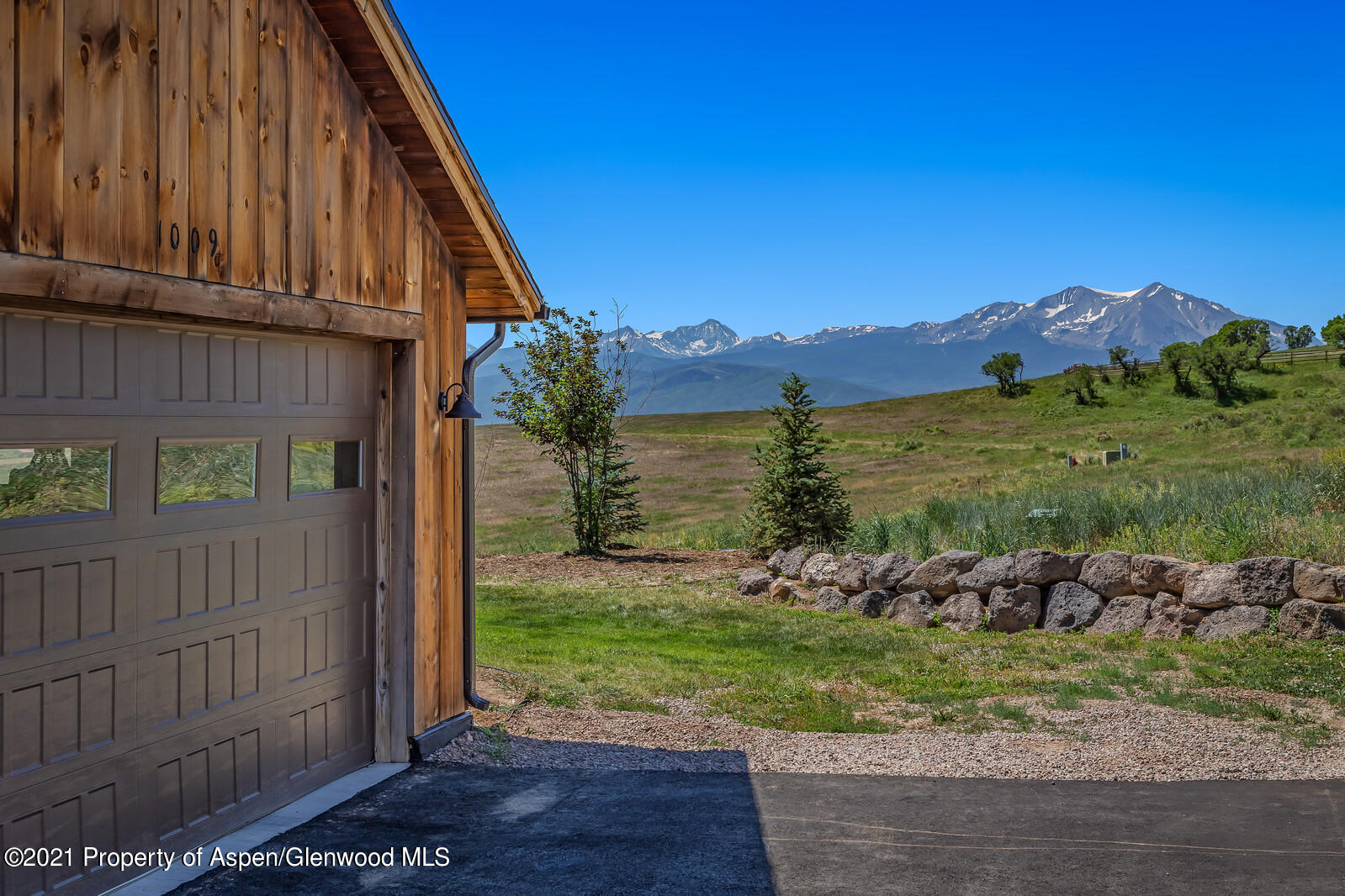 1009 Cattle Creek Ridge Road Carbondale, CO 81623 - Photo 30 of 40 a view of a two dinning table and chairs in the patio