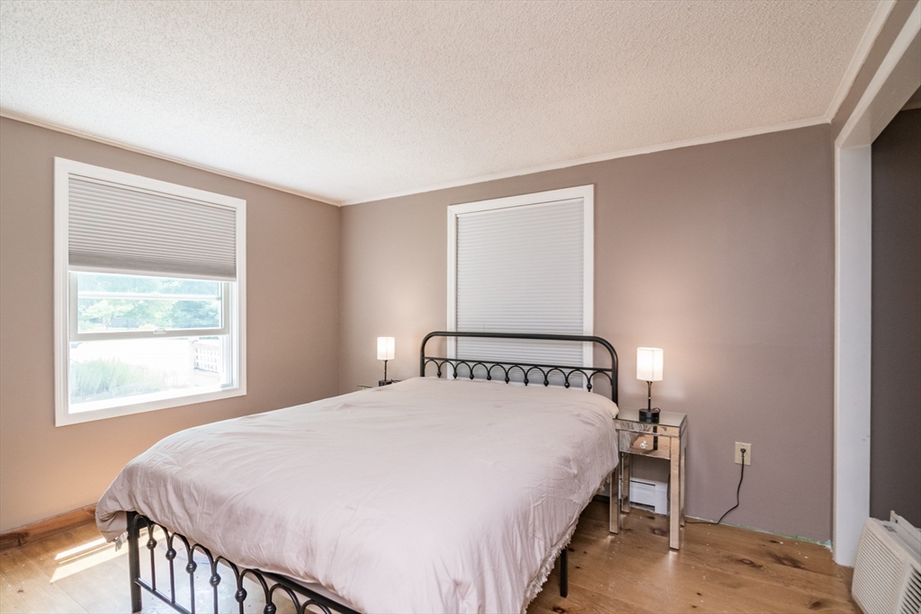 183 Millers Falls Road Montague, MA 01376 - Photo 17 of 33 a bedroom with a bed and a window