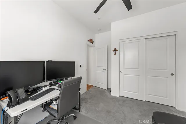 a view of a workspace with furniture