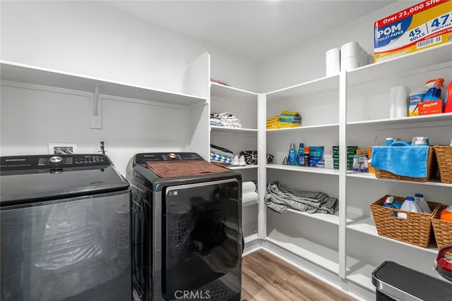 a storage room with washer and dryer