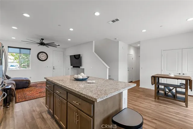 a kitchen with a table and chairs in it