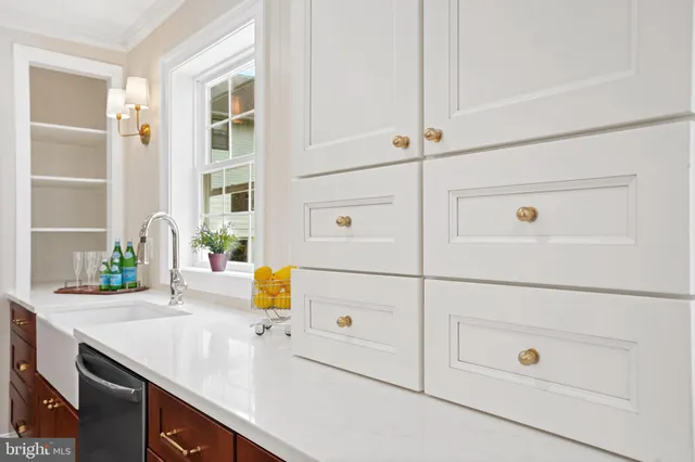 a living room with furniture couches and a fireplace