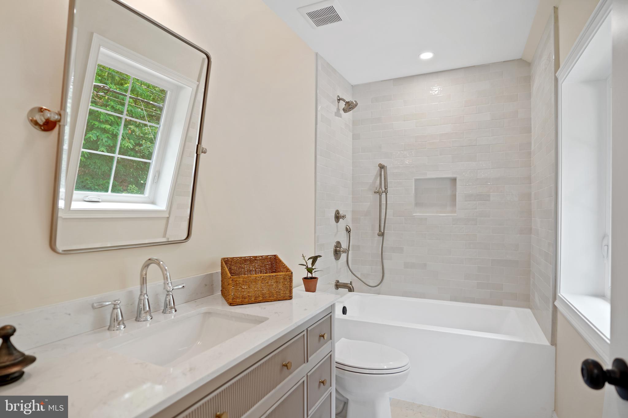 3722 13th Street Northeast Washington, DC 20017 - Photo 25 of 50 a bathroom with a granite countertop sink toilet and shower