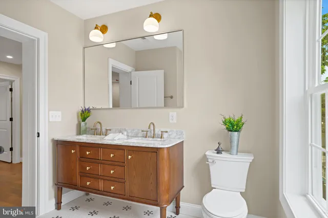 a bathroom with a tub and a shower
