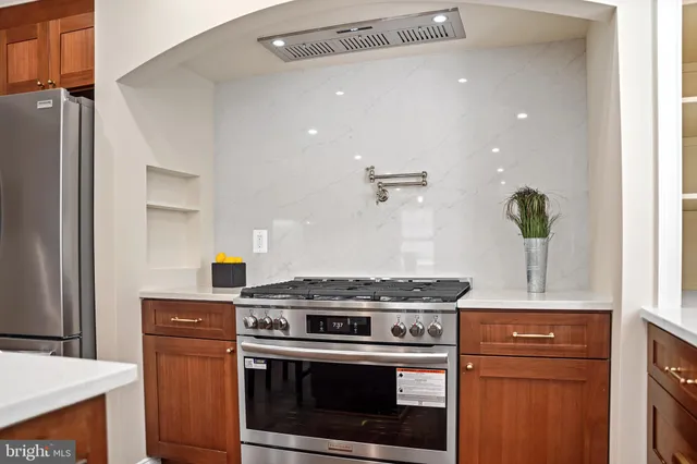 a living room with a table and window