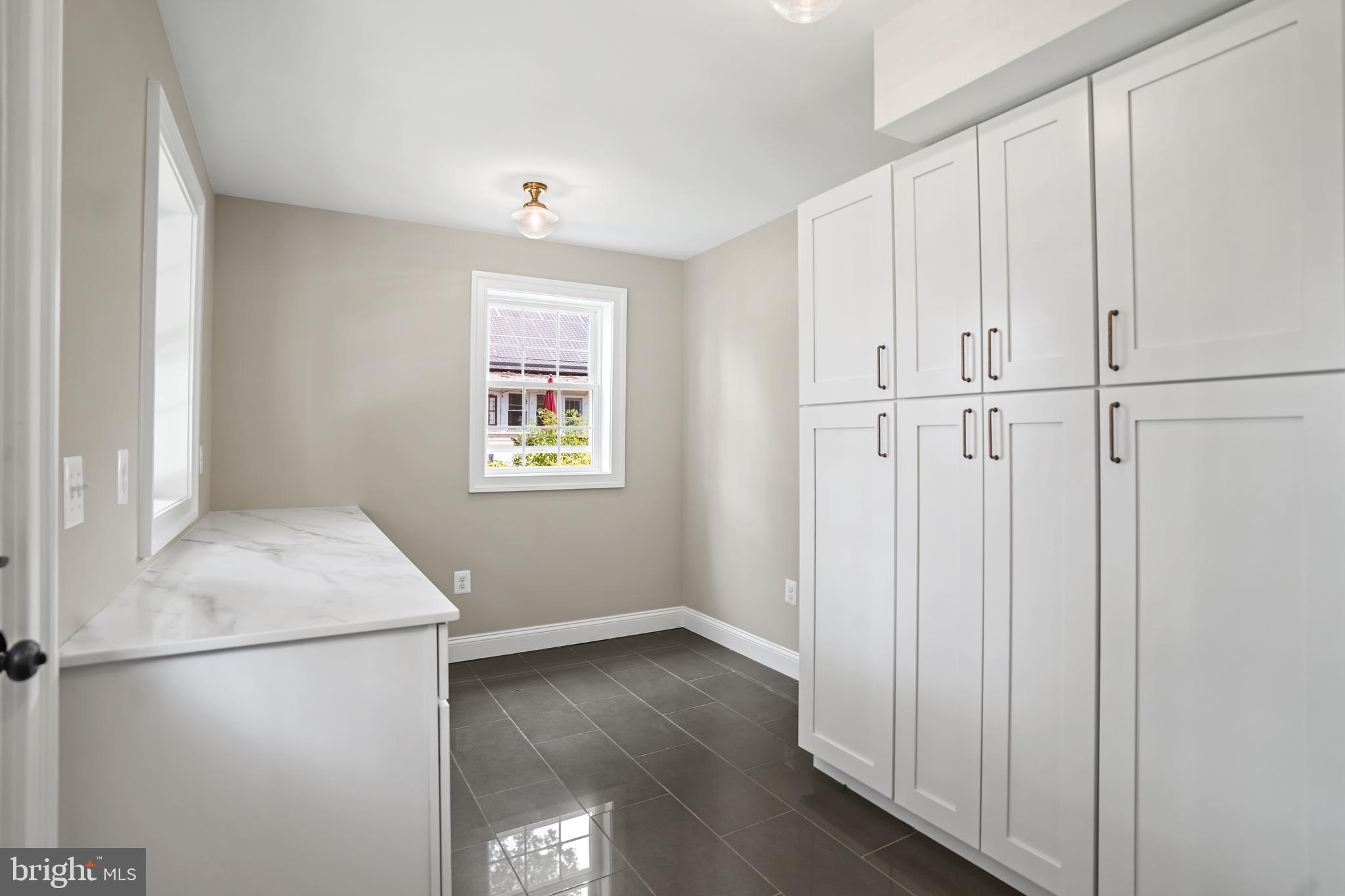 3722 13th Street Northeast Washington, DC 20017 - Photo 47 of 50 a view of a kitchen with refrigerator and wooden floor