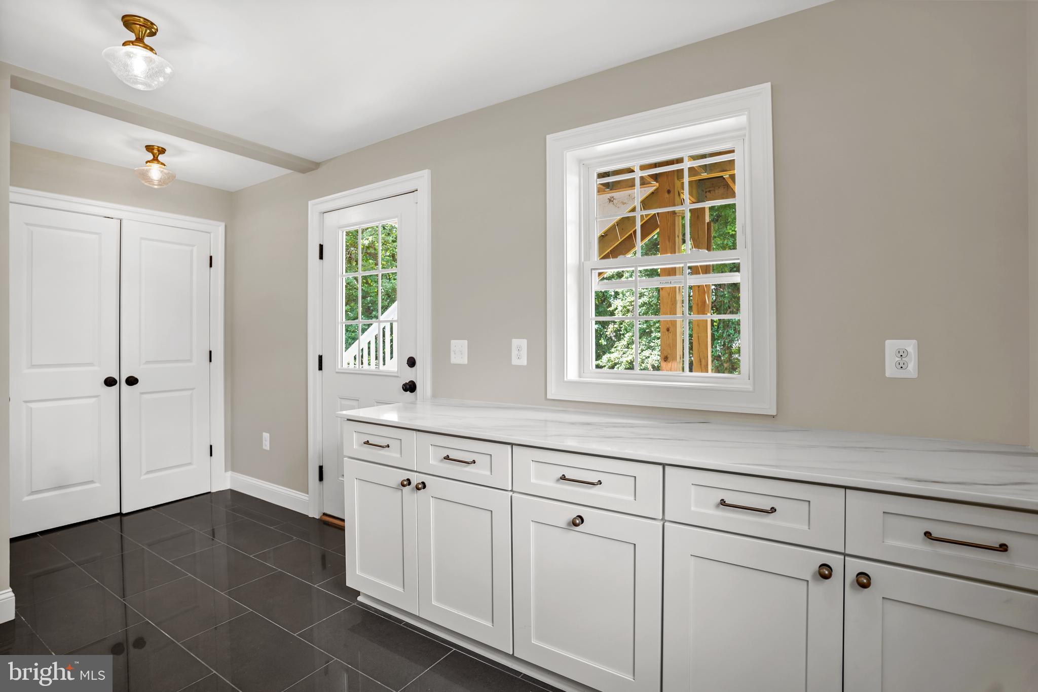 3722 13th Street Northeast Washington, DC 20017 - Photo 48 of 50 a bathroom with a sink and a window